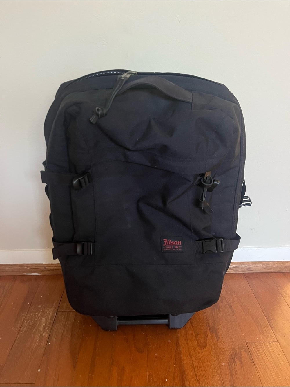 Filson Black Rolling Travel Backpack